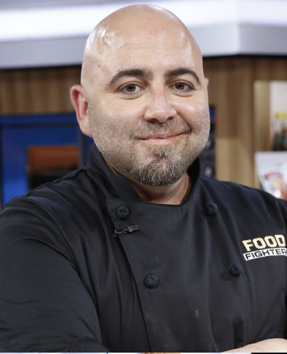 picture of of a male chef smiling